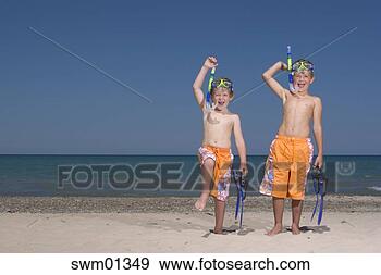 Stock Photograph - two young boys 
standing in snorkeling 
masks. fotosearch 
- search stock 
photos, pictures, 
images, and photo 
clipart