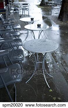 Stock Photography - wet sidewalk tables 
and chairs. fotosearch 
- search stock 
photos, pictures, 
images, and photo 
clipart