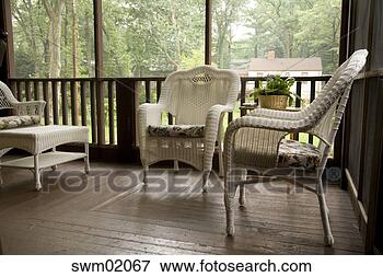 Picture - wicker furniture 
in covered porch. 
fotosearch - search 
stock photos, 
pictures, images, 
and photo clipart