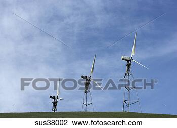 Stock Photo - windmills on hill. 
fotosearch - search 
stock photos, 
pictures, images, 
and photo clipart