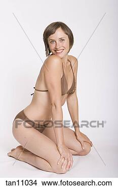 Stock Photo - woman in bikini. 
fotosearch - search 
stock photos, 
pictures, images, 
and photo clipart