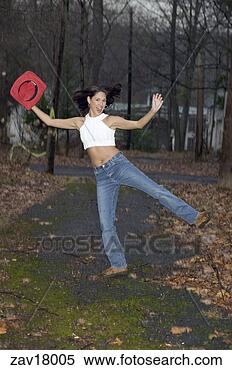 Stock Image - woman dancing 
on rural road. 
fotosearch - search 
stock photos, 
pictures, images, 
and photo clipart