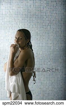 Stock Photo - woman drying off 
with towel. fotosearch 
- search stock 
photos, pictures, 
images, and photo 
clipart