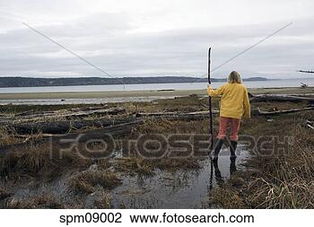 Stock Photo - woman hiking in 
swamp. fotosearch 
- search stock 
photos, pictures, 
images, and photo 
clipart
