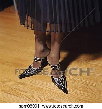 Stock Photography - woman in ornate 
high heels. fotosearch 
- search stock 
photos, pictures, 
images, and photo 
clipart