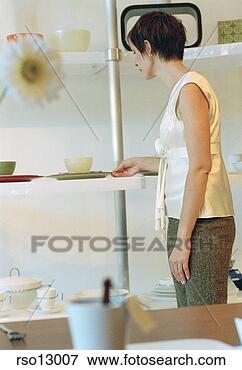 Picture - woman shopping 
for household 
items. fotosearch 
- search stock 
photos, pictures, 
images, and photo 
clipart