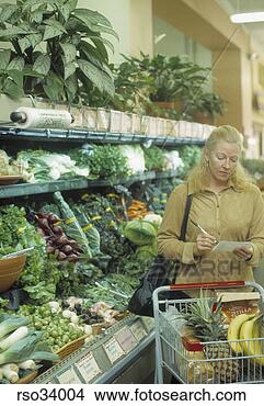 Stock Photo - woman shopping 
for produce. fotosearch 
- search stock 
photos, pictures, 
images, and photo 
clipart