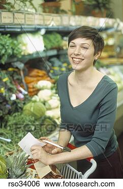 Stock Photo - woman shopping 
for produce. fotosearch 
- search stock 
photos, pictures, 
images, and photo 
clipart