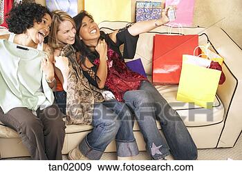 Stock Photograph - women photographing 
themselves. fotosearch 
- search stock 
photos, pictures, 
images, and photo 
clipart