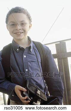Stock Image - young african 
boy with backpack. 
fotosearch - search 
stock photos, 
pictures, images, 
and photo clipart