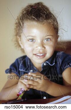 Stock Photo - young african 
girl holding crayons. 
fotosearch - search 
stock photos, 
pictures, images, 
and photo clipart