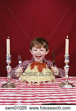 Stock Photograph - young boy with 
giant plate of 
spaghetti. fotosearch 
- search stock 
photos, pictures, 
images, and photo 
clipart