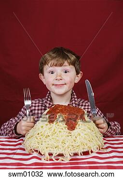 Stock Photo - young boy with 
giant plate of 
spaghetti. fotosearch 
- search stock 
photos, pictures, 
images, and photo 
clipart