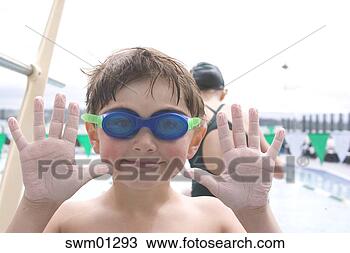 Stock Photo - young boy showing 
off wrinkled fingers. 
fotosearch - search 
stock photos, 
pictures, images, 
and photo clipart
