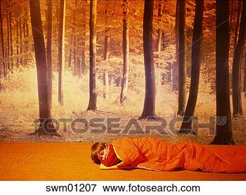 Picture - young boy sleeping 
in sleeping bag. 
fotosearch - search 
stock photos, 
pictures, images, 
and photo clipart