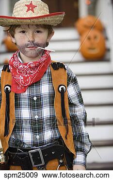 Stock Photograph - young boy trick 
or treating on 
halloween. fotosearch 
- search stock 
photos, pictures, 
images, and photo 
clipart