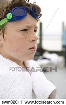 Stock Photography - young boy wearing 
goggles and towel. 
fotosearch - search 
stock photos, 
pictures, images, 
and photo clipart