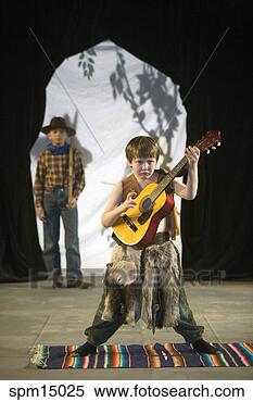 Stock Image - young boys in 
costume on stage. 
fotosearch - search 
stock photos, 
pictures, images, 
and photo clipart