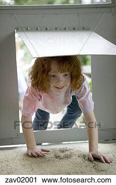 Stock Photography - young girl climbing 
in through dog 
door. fotosearch 
- search stock 
photos, pictures, 
images, and photo 
clipart