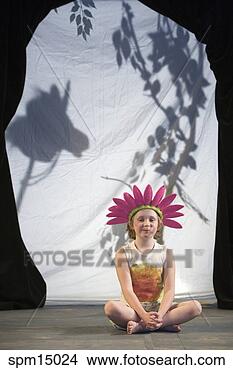 Stock Photo - young girl in 
costume on stage. 
fotosearch - search 
stock photos, 
pictures, images, 
and photo clipart