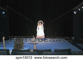 Stock Photo - young girl in 
fairy costume 
on stage. fotosearch 
- search stock 
photos, pictures, 
images, and photo 
clipart
