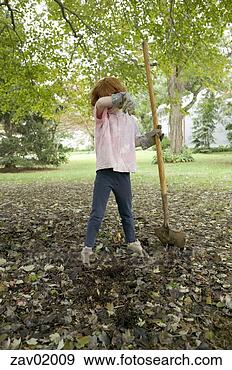 Stock Photograph - young girl gardening 
in backyard. fotosearch 
- search stock 
photos, pictures, 
images, and photo 
clipart