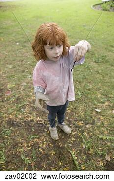 Stock Photo - young girl looking 
at worm in backyard. 
fotosearch - search 
stock photos, 
pictures, images, 
and photo clipart