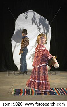 Stock Photo - young girl performing 
on stage. fotosearch 
- search stock 
photos, pictures, 
images, and photo 
clipart