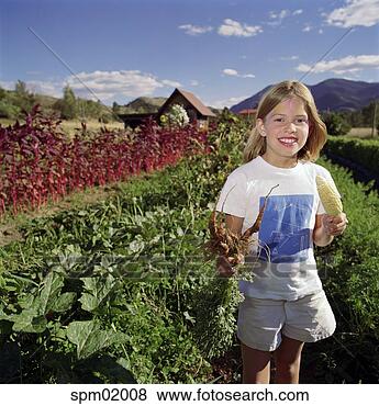 Stock Photo - young girl picking 
crops. fotosearch 
- search stock 
photos, pictures, 
images, and photo 
clipart