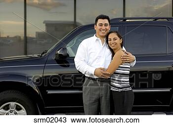 Stock Photo - young hispanic 
family with sports 
utility vehicle. 
fotosearch - search 
stock photos, 
pictures, images, 
and photo clipart