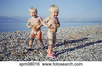 Stock Photo - young naked children 
covered in face 
paint. fotosearch 
- search stock 
photos, pictures, 
images, and photo 
clipart