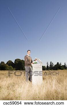 Stock Photo - businessman next 
to copier in field. 
fotosearch - search 
stock photos, 
pictures, images, 
and photo clipart