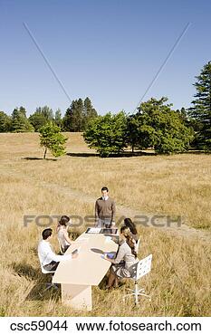 Stock Photo - businesspeople 
at conference 
table in field. 
fotosearch - search 
stock photos, 
pictures, images, 
and photo clipart