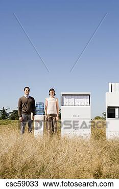 Stock Photo - businesspeople 
next to water 
cooler in field. 
fotosearch - search 
stock photos, 
pictures, images, 
and photo clipart