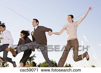 Stock Photography - businesspeople 
running in field. 
fotosearch - search 
stock photos, 
pictures, images, 
and photo clipart