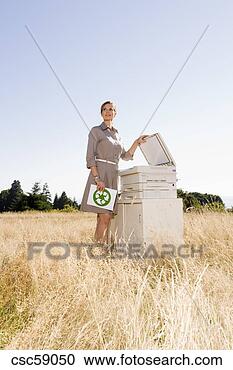 Stock Photography - businesswoman 
next to copier 
in field. fotosearch 
- search stock 
photos, pictures, 
images, and photo 
clipart