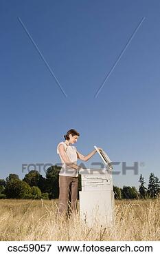 Picture - businesswoman 
next to copier 
in field. fotosearch 
- search stock 
photos, pictures, 
images, and photo 
clipart