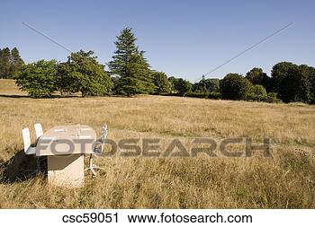 Stock Photography - conference table 
in field. fotosearch 
- search stock 
photos, pictures, 
images, and photo 
clipart