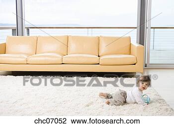 Stock Photo - baby crawling 
on rug. fotosearch 
- search stock 
photos, pictures, 
images, and photo 
clipart