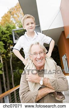 Stock Photography - grandfather holding 
grandson on shoulders. 
fotosearch - search 
stock photos, 
pictures, images, 
and photo clipart