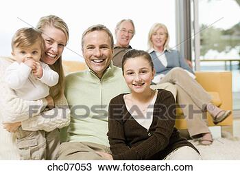 Stock Photo - multi-generational 
family in living 
room. fotosearch 
- search stock 
photos, pictures, 
images, and photo 
clipart