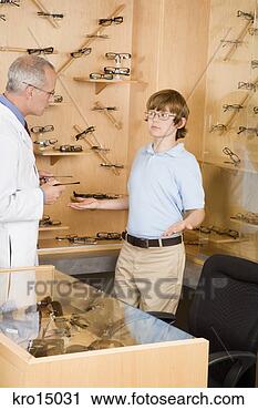 Stock Photography - boy talking to 
optician. fotosearch 
- search stock 
photos, pictures, 
images, and photo 
clipart