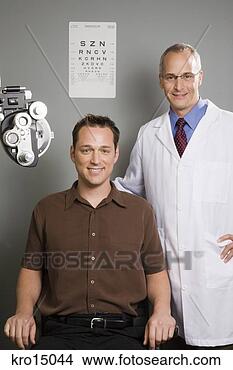 Stock Photo - male ophthalmologist 
and man in office. 
fotosearch - search 
stock photos, 
pictures, images, 
and photo clipart