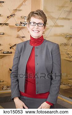 Stock Photo - woman in optician’s 
office. fotosearch 
- search stock 
photos, pictures, 
images, and photo 
clipart