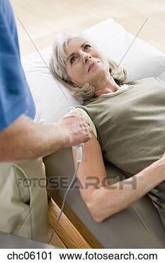 Stock Photography - physical therapist 
treating woman’s 
shoulder. fotosearch 
- search stock 
photos, pictures, 
images, and photo 
clipart