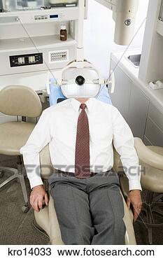 Stock Photo - businessman sitting 
in dental chair. 
fotosearch - search 
stock photos, 
pictures, images, 
and photo clipart
