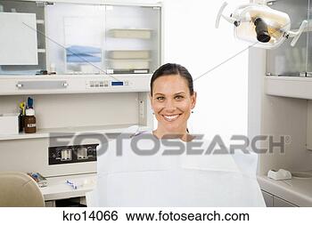 Stock Photo - woman sitting 
in dental chair. 
fotosearch - search 
stock photos, 
pictures, images, 
and photo clipart