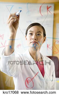 Stock Photo - asian female scientist 
writing on clear 
board. fotosearch 
- search stock 
photos, pictures, 
images, and photo 
clipart