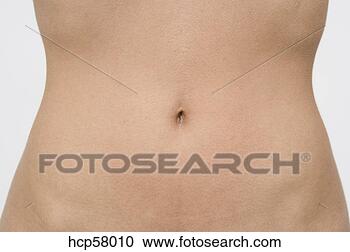 Stock Photography - close up of woman’s 
bellybutton. fotosearch 
- search stock 
photos, pictures, 
images, and photo 
clipart