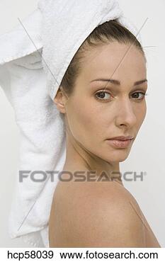 Stock Photograph - woman wearing 
hair wrapped in 
towel. fotosearch 
- search stock 
photos, pictures, 
images, and photo 
clipart